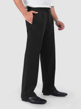 Man wearing black relaxed fit pleated pants with belt loops and side pockets.