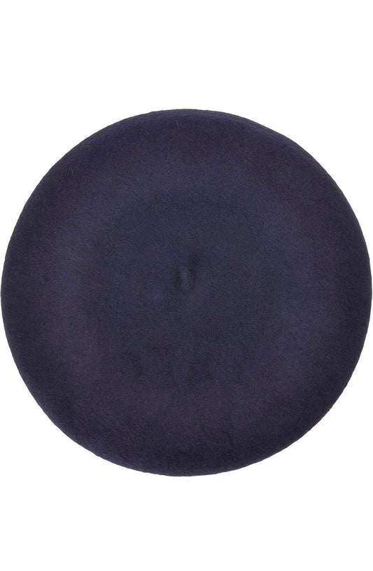 Side view of a dark navy classic beret with a small stem on top