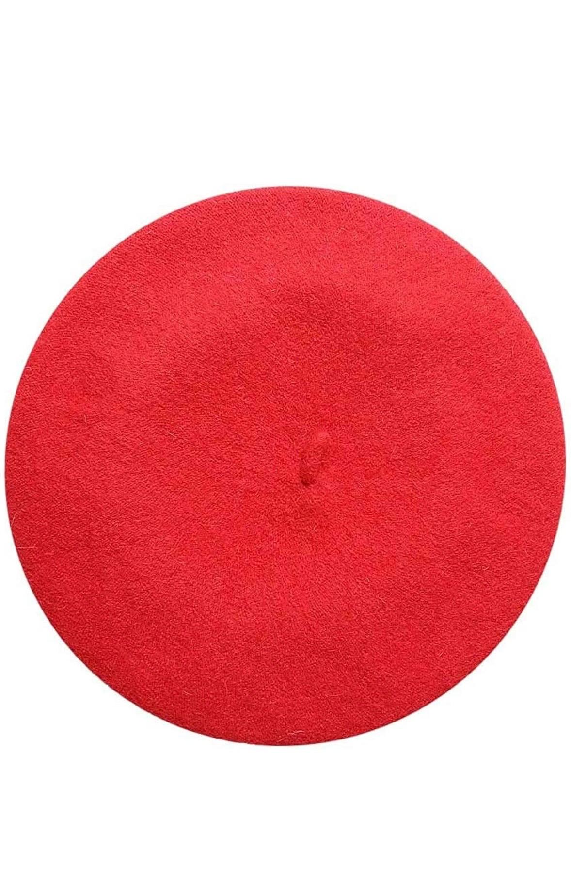Bright red beret hat with a small stem on top, shown from multiple angles