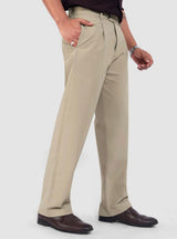 Close-up of men's khaki pleated trousers, showing pleats, pockets, and a button closure.