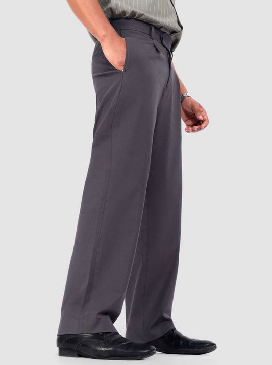 Close-up view of men's charcoal gray wide-leg pleated trousers with a visible button and zipper closure, and pockets.