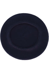 Side view of a dark navy classic beret with a small stem on top